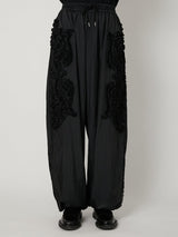 SCULPTURAL EMBROIDERY TRACK PANTS - TAAKK